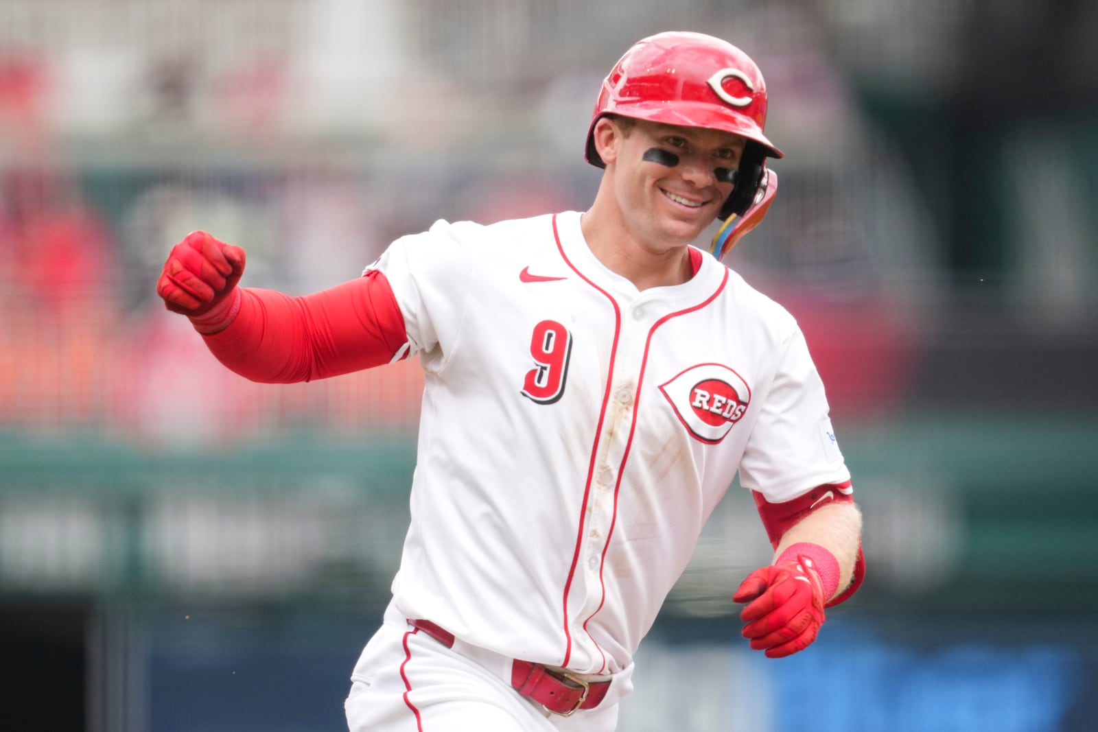 Cincinnati Reds' Matt McLain reacts as he rounds the bases after hitting a solo home run during the sixth inning of a baseball game against the Chicago White Sox, Thursday, May 15, 2025, in Cincinnati. (AP Photo/Jeff Dean)