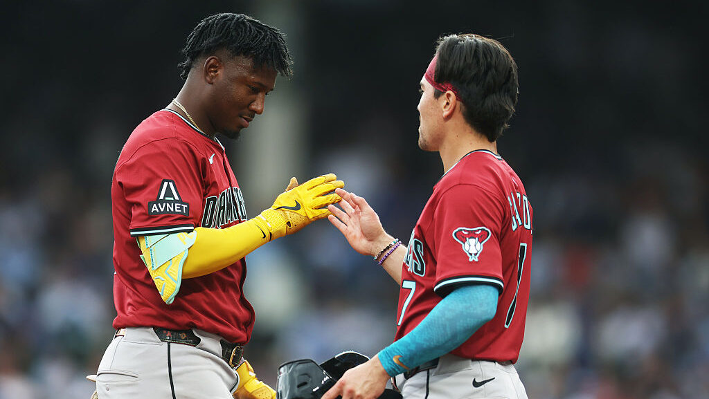 Corbin Carroll #7 and Geraldo Perdomo #2 of the Arizona Diamondbacks...