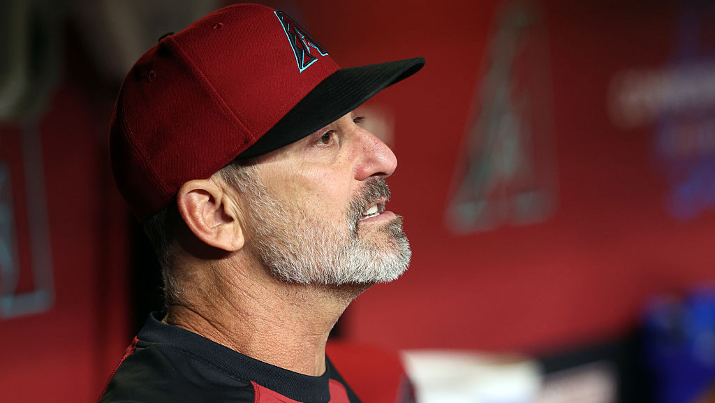 Manager Torey Lovullo #17 of the Arizona Diamondbacks watches the action during the seventh inning ...