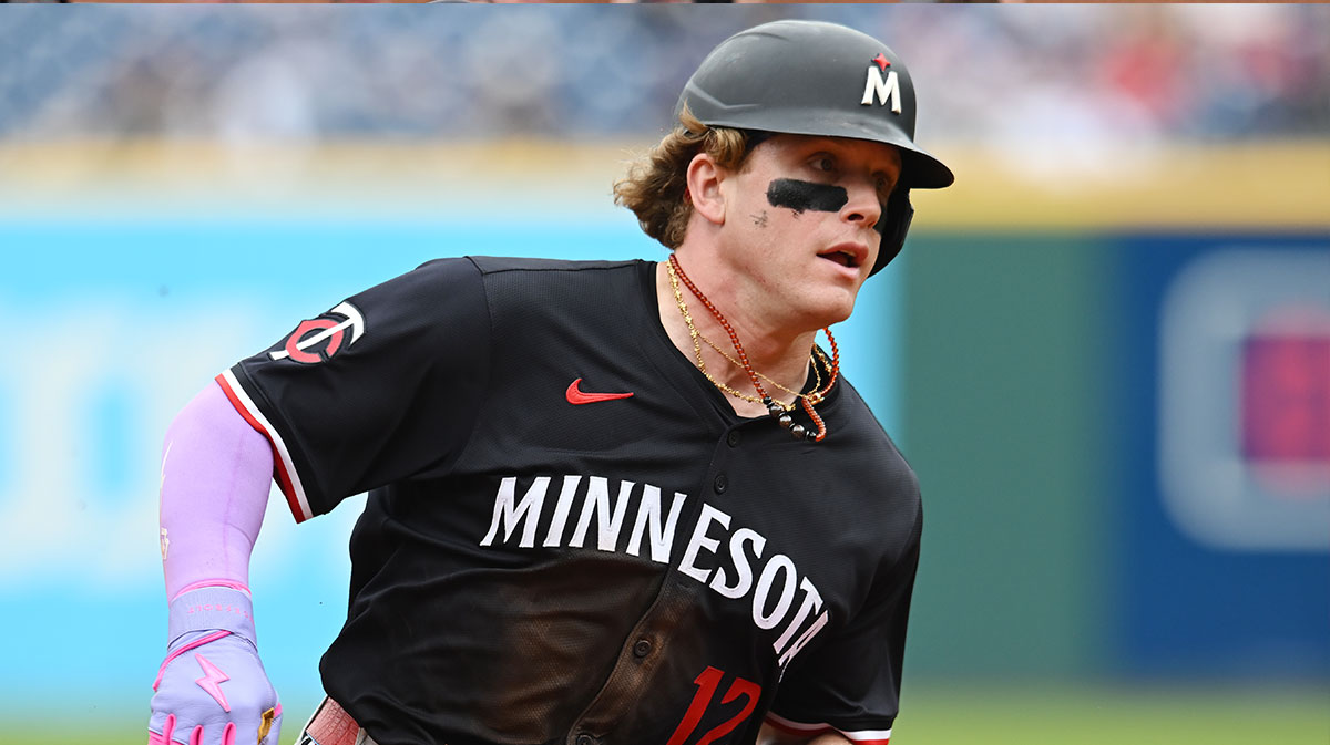 Minnesota Twins left fielder Harrison Bader (12) rounds third base en route to scoring during the seventh inning against the Cleveland Guardians at Progressive Field.