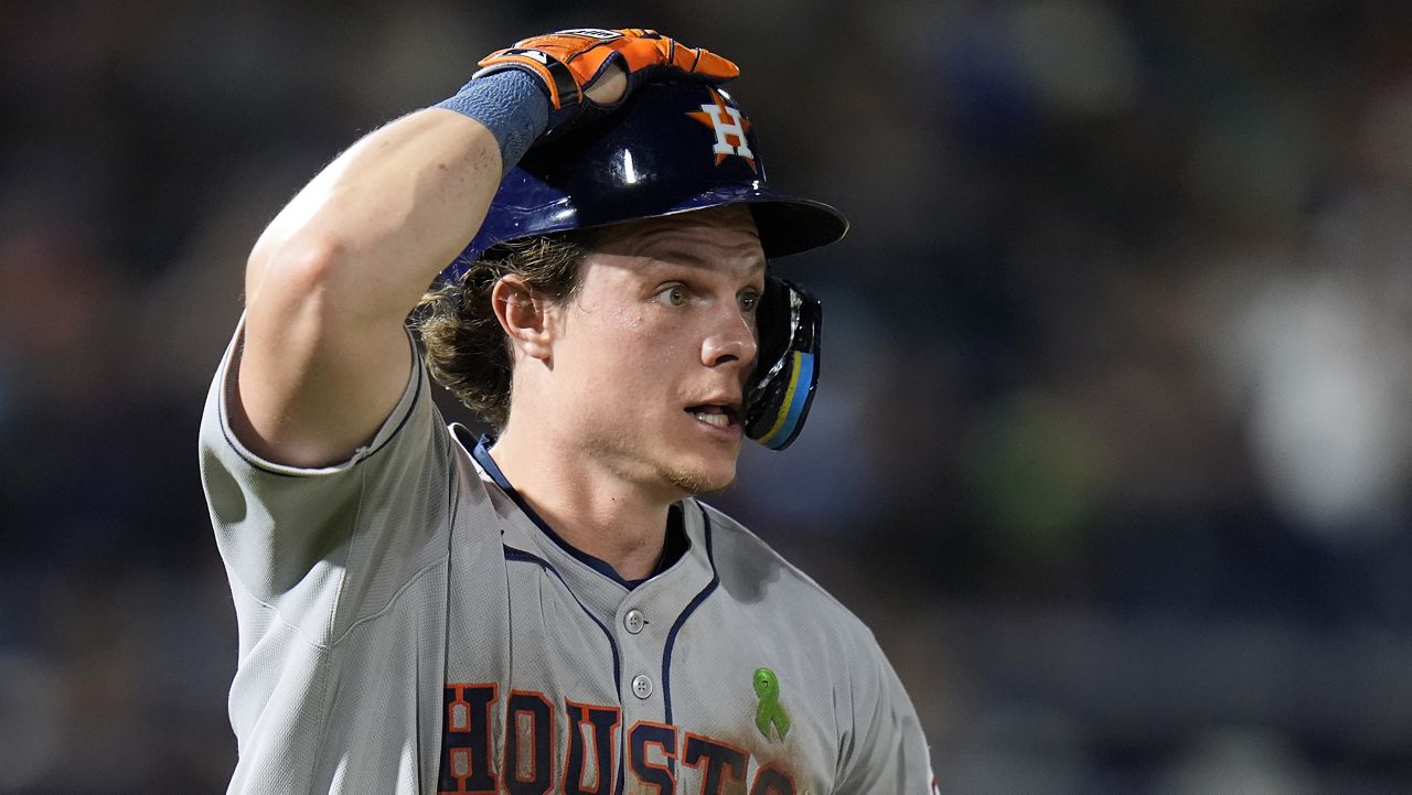 Houston Astros' Jake Meyers watches his solo home run off Tampa Bay Rays pitcher Manuel Rodríguez clear the fence during the seventh inning of a baseball game Monday, May 19, 2025, in Tampa, Fla. (AP Photo/Chris O'Meara)