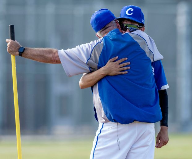 Chino head coach Michael St Esteben hugs Chino’s Xiovany Ochoa...