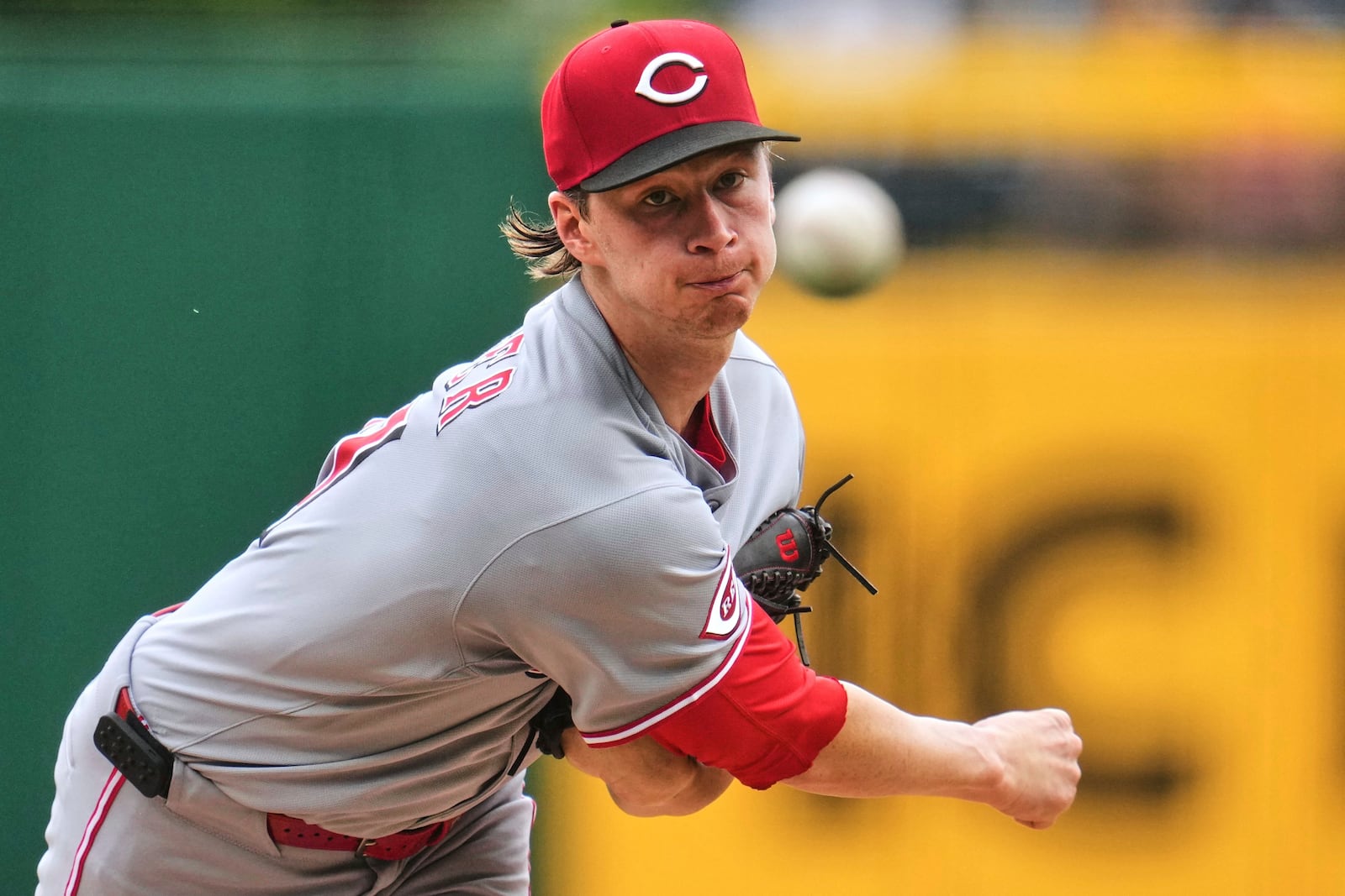 Cincinnati Reds pitcher Brady Singer delivers during the first inning of a baseball game against the Pittsburgh Pirates in Pittsburgh, Wednesday, May 21, 2025. (AP Photo/Gene J. Puskar)