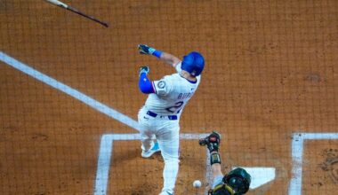 Texas Rangers' Jake Burger loses his bat while swinging at a pitch from Oakland Athletics starting pitcher Luis Severino during the first inning of a baseball game Wednesday, April 30, 2025, in Arlington, TX. (AP Photo/Julio Cortez)