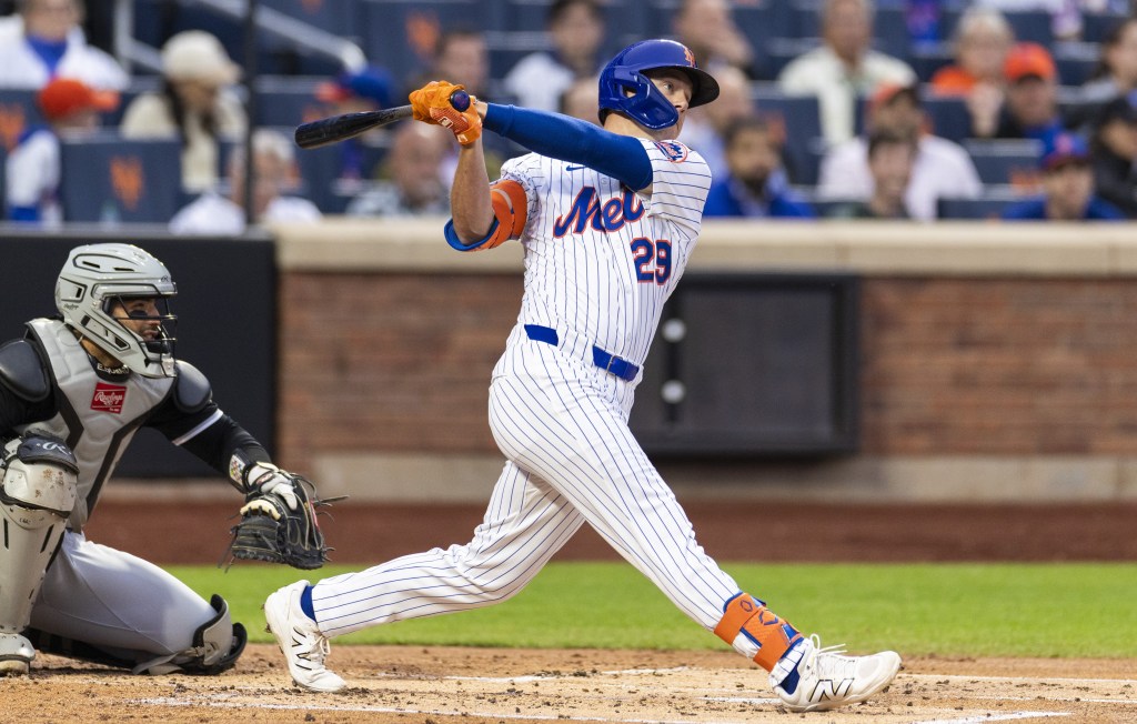 Jared Young belts a two-run homer during the first inning of the Mets' 6-4 win over the White Sox on May 27, 2025.