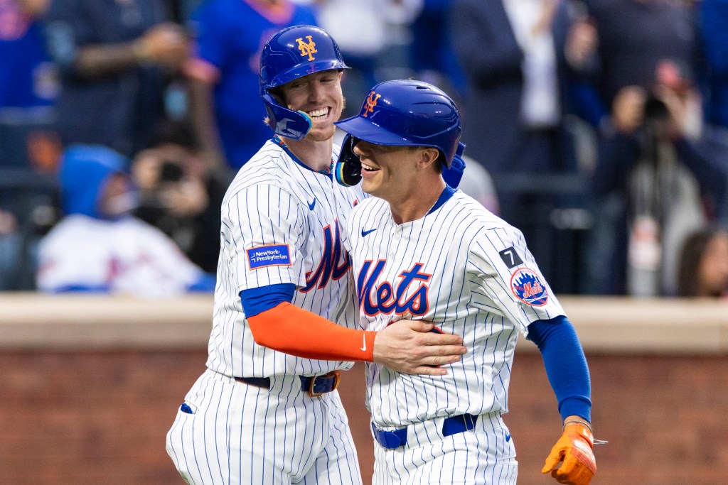 Jared Young (right() get congratulations from Brett Baty after blasting a two-run homer in the first inning of the Mets' win over the White Sox.