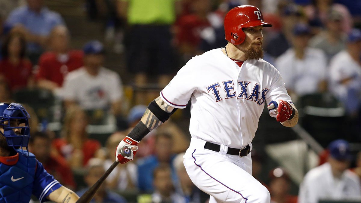 Texas Rangers left fielder Josh Hamilton hits a single against the Toronto Blue Jays in the fifth inning in game three of the ALDS at Globe Life Park in Arlington.