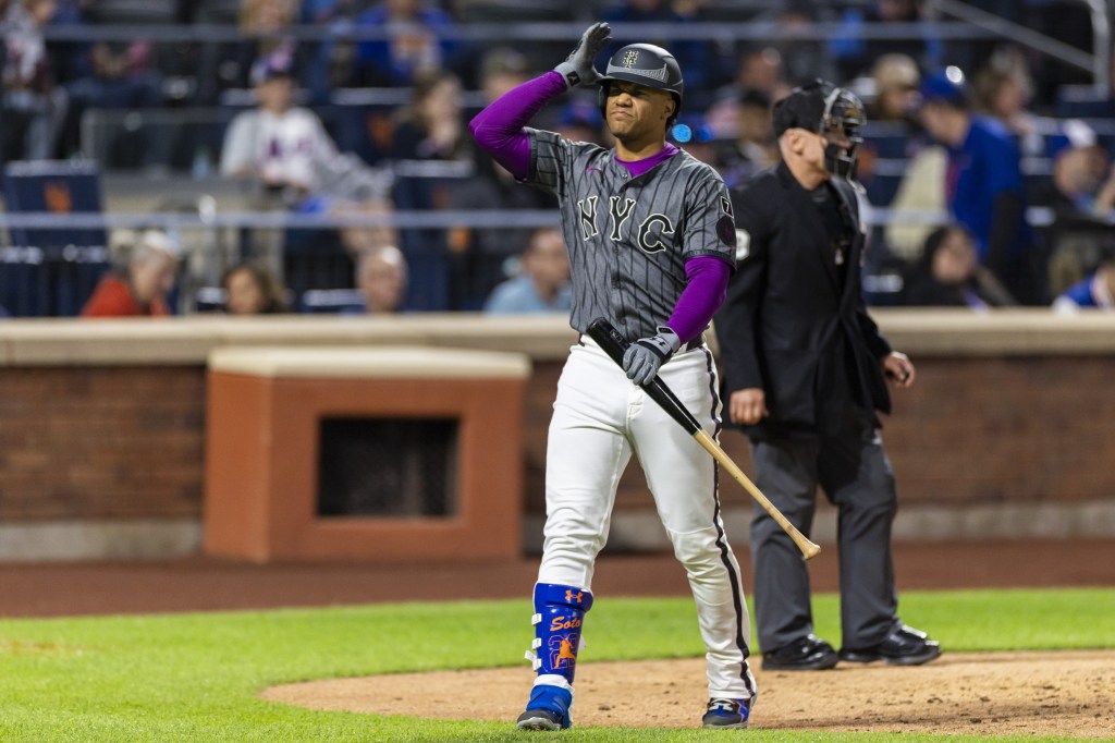 Juan Soto, who went 0-for-5, walks to the dugout after striking out in the seventh inning of the Mets' 6-5 loss to the Cubs on May 10, 2025.