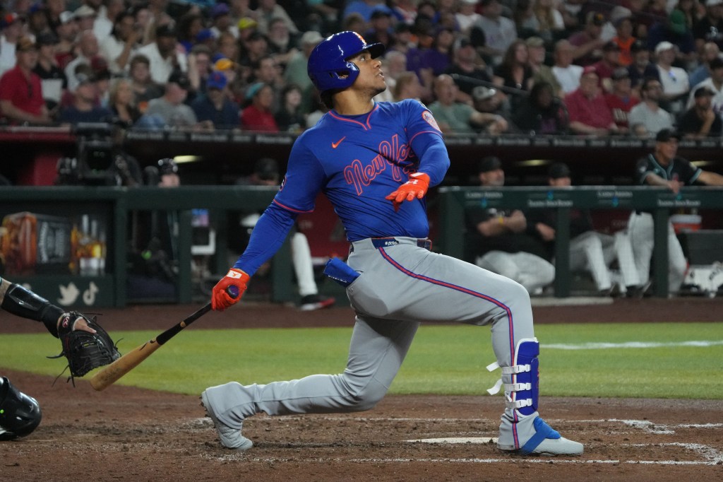 Juan Soto hits a solo homer, one of his two long balls, in the sixth inning of the Mets' 7-1 win over the Diamondbacks on May 7, 2025.