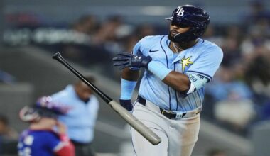 Tampa Bay Rays' Junior Caminero (13) celebrates his grand slam against the Toronto Blue Jays during ninth inning MLB baseball action in Toronto on Tuesday, May 13, 2025. (Nathan Denette/The Canadian Press via AP)
