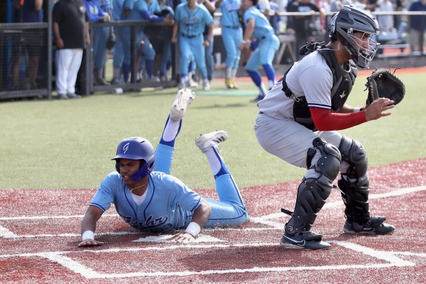 Gahr junior Bryce Morrison scores one of Gahr’s five runs...