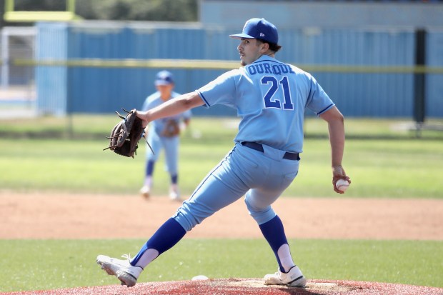 Gahr junior Jake Ourique delivers a pitch in the Gladiators’...