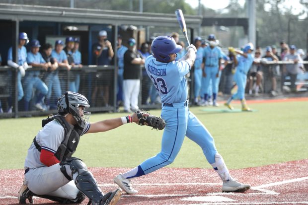 Gahr first baseman Bryce Morrison follows through on his two-run...