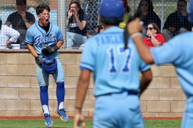 Gahr senior Jake Curneen is pumped up after scoring the...