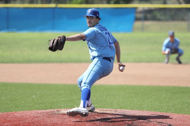 Gahr junior Jake Ourique delivers a pitch in the Gladiators’...