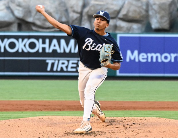 Warren's Angel Cervantes (99) pitches against Long Beach Wilson during a game at Angel Stadium on April 11, 2025, in Anaheim, CA. (Photo by John McCoy, Contributing Photographer)