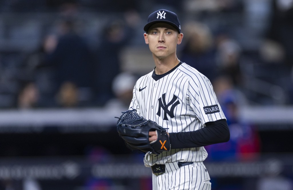 Luke Weaver walks off the field after getting out of the ninth inning in the Yankees' 4-3 walk-off win over the Rangers on May 21, 2025.