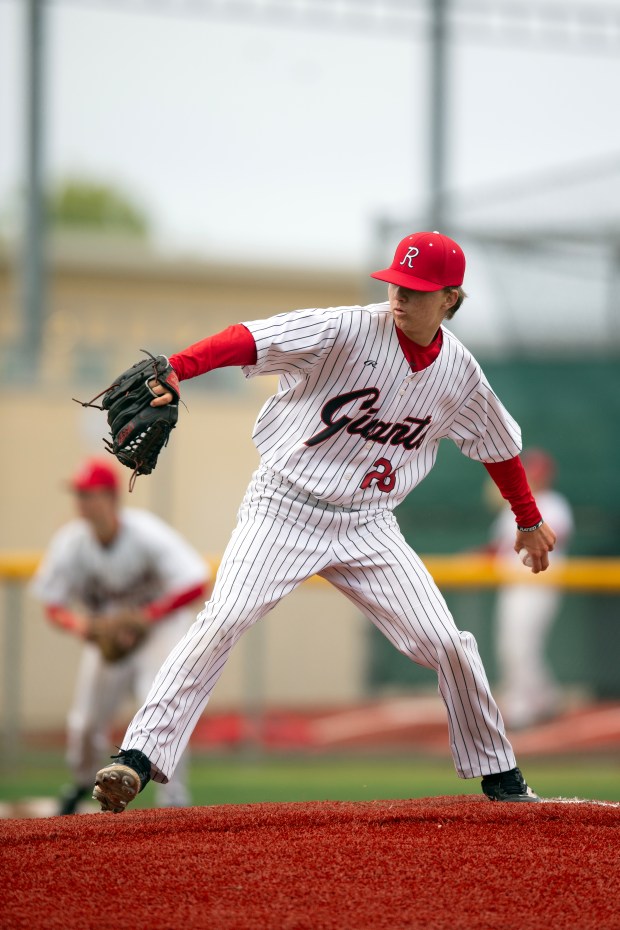 Redwood pitcher Maxim Wells (28) delivers against San Rafael after...