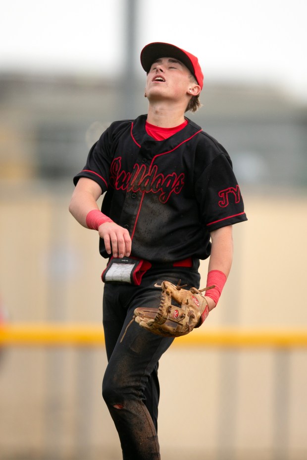 San Rafael starting pitcher Colby Jackson (32) reacts to issuing...