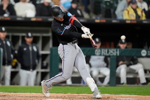 Wagaman breaks tie in 8th with 2-run triple to lift Marlins over White Sox 3-1