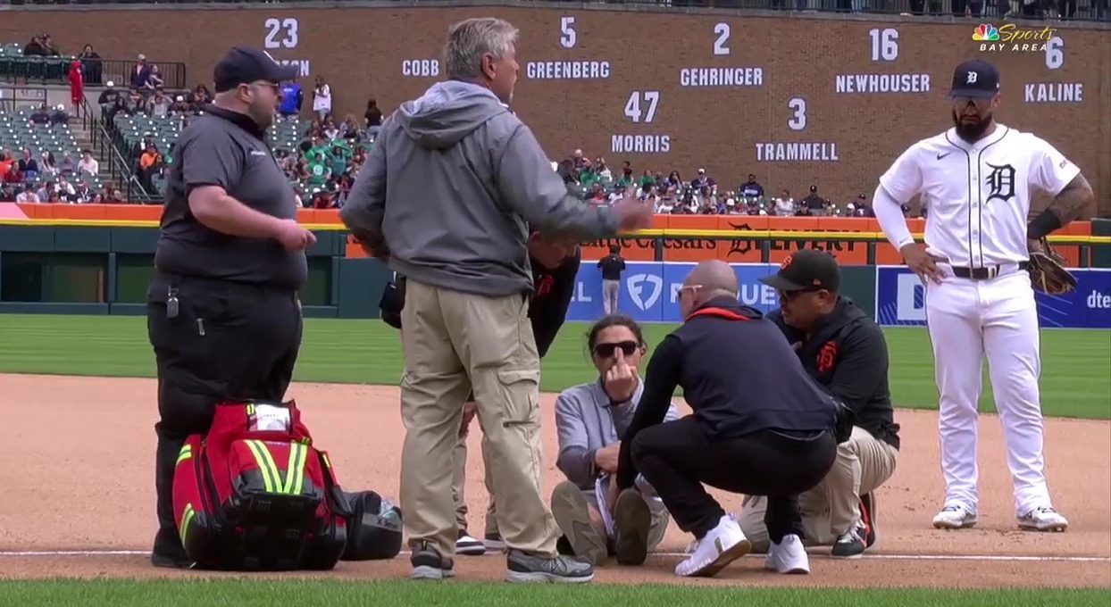 Injured grounds crew member flips cameras off during MLB game