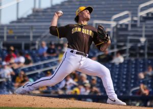 Padres prospect Tyson Neighbors pitches in spring training in 2025.
