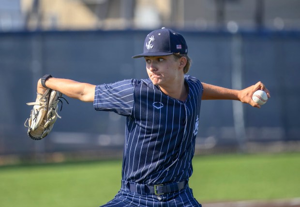 Newport Harbor reliever Tyler Clark delivers a pitch against Santa...