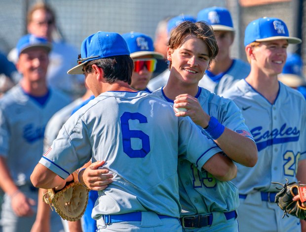 Santa Margarita’s Carter Enoch, right, hugs Blake Ankrum after the...