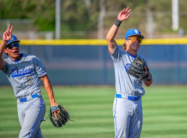 Santa Margarita’s Gavin Spiridonoff, left, and Brody Schumaker wave goodbye...