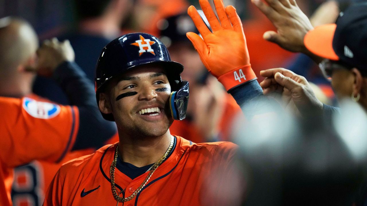 Houston Astros' Cam Smith celebrates the dugout after hitting a home run during the second inning of a baseball game against the San Diego Padres in Houston, Friday, April 18, 2025. Yainer Diaz and Jake Meyers also scored.(AP Photo/Ashley Landis)