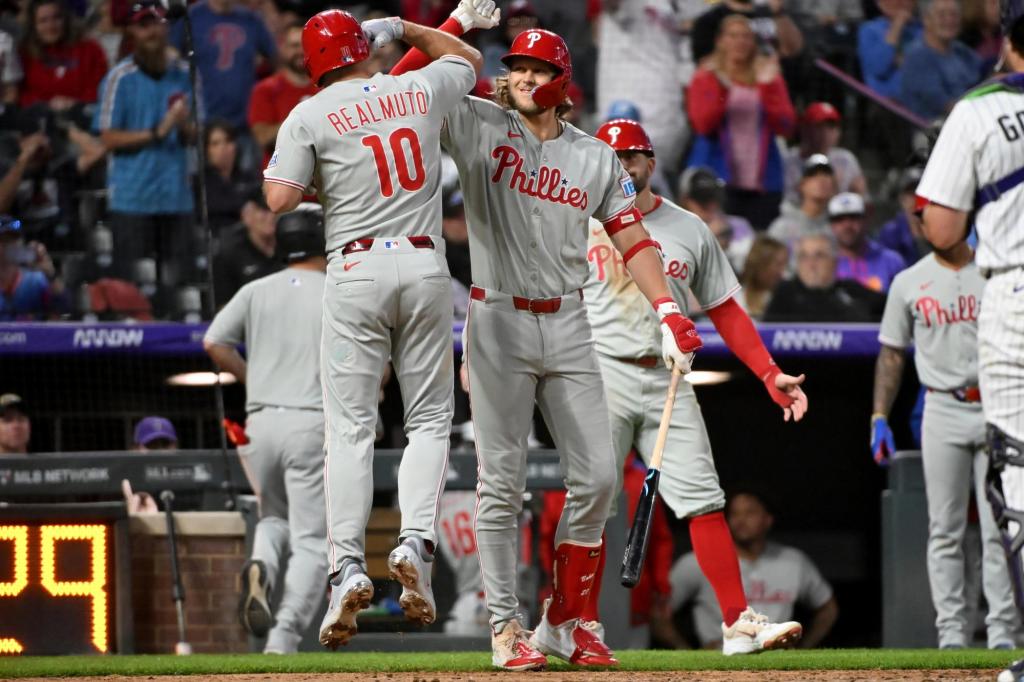 Realmuto, Turner, Harper homer to help Phillies beat Rockies