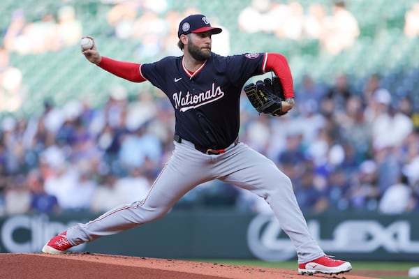 Washington Nationals starting pitcher Trevor Williams throws during the first inning of a baseball game against the Seattle Mariners, Wednesday, May 28, 2025, in Seattle. (AP Photo/Ryan Sun)