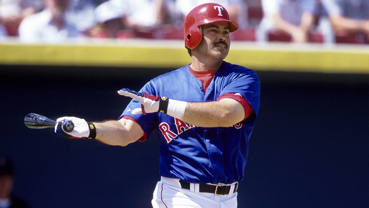 Texas Rangers infielder Rafael Palmeiro in action at the plate during spring training at Charlotte County Stadium.