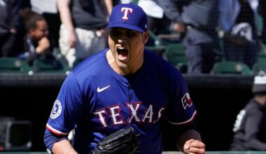 Texas Rangers pitcher Robert Garcia (62) celebrates after getting the final out against the Chicago White Sox during the ninth inning of a baseball game Sunday, May 25, 2025, in Chicago. (AP Photo/David Banks)