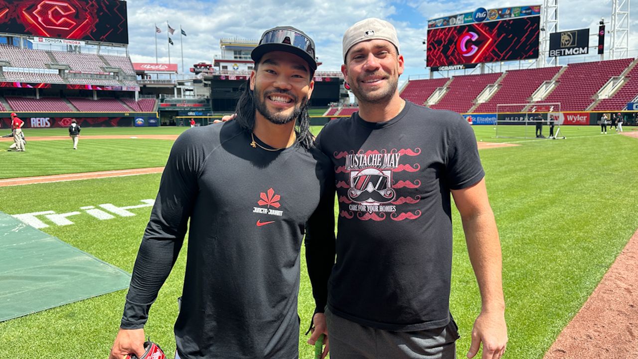Connor Joe (left) and Austin Wynns share the baseball field for the first time since high school (Spectrum News 1/Katie Kapusta)