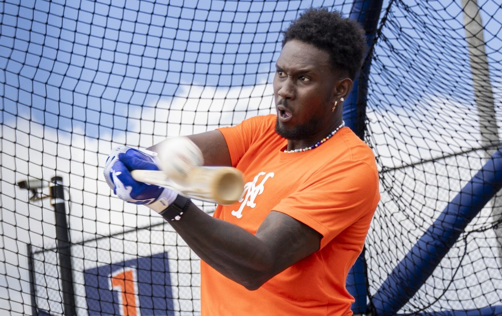 Ronny Mauricio, who has been red-hot at Triple-A, works on a hitting drill during Mets' spring training.