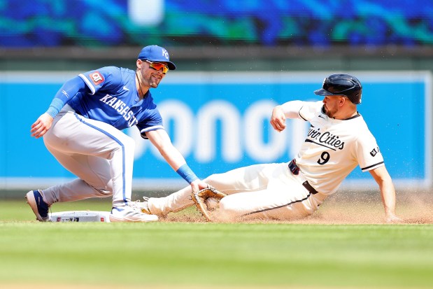 Michael Massey #19 of the Kansas City Royals tags out Trevor Larnach #9 of the Minnesota Twins on a steal attempt at second base in the seventh inning at Target Field on May 25, 2025 in Minneapolis, Minnesota. The Royals defeated the Twins 2-1 in ten innings. (Photo by David Berding/Getty Images)
