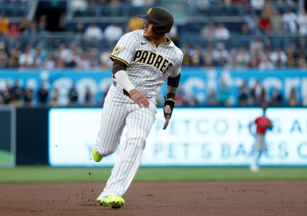 San Diego Padres' Manny Machado advances to third base on a Jackson Merrill double in the first inning at Petco Park on Monday, May 12, 2025. (K.C. Alfred / The San Diego Union-Tribune)