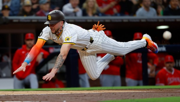 San Diego Padres' Jackson Merrill scores on a throwing error in the third inning at Petco Park on Monday, May 12, 2025. (K.C. Alfred / The San Diego Union-Tribune)