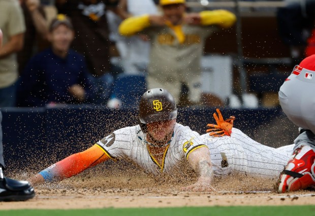 San Diego Padres' Jackson Merrill scores on a throwing error in the third inning at Petco Park on Monday, May 12, 2025. (K.C. Alfred / The San Diego Union-Tribune)