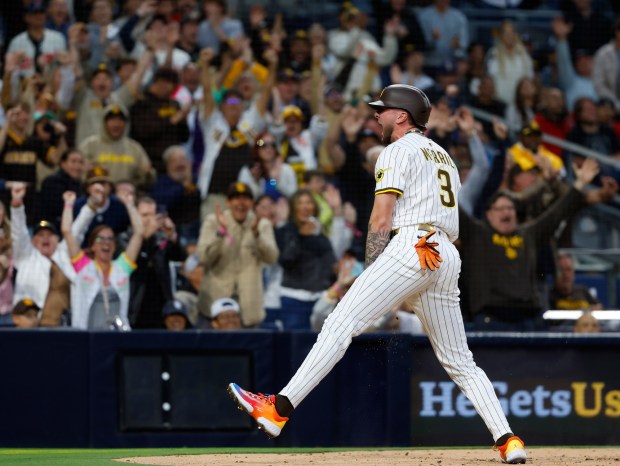 San Diego Padres' Jackson Merrill celebrates after scoring on a throwing error in the third inning at Petco Park on Monday, May 12, 2025. (K.C. Alfred / The San Diego Union-Tribune)