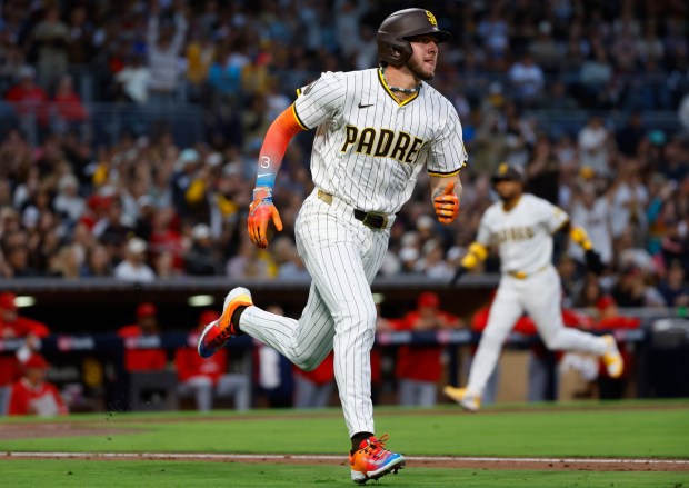 San Diego Padres' Jackson Merrill runs to first base after hitting a RBI single in the third inning at Petco Park on Monday, May 12, 2025. (K.C. Alfred / The San Diego Union-Tribune)
