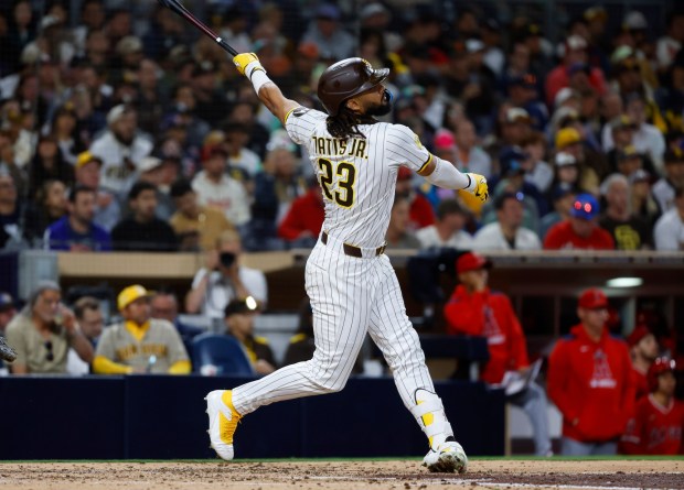 San Diego Padres' Fernando Tatis Jr. hits a solo home run in the fifth inning against the Los Angeles Angels at Petco Park on Monday, May 12, 2025. (K.C. Alfred / The San Diego Union-Tribune)
