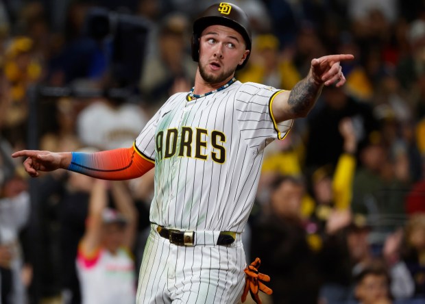 San Diego Padres' Jackson Merrill scores on a Xander Bogaerts sacrifice in the eighth inning against the Los Angeles Angels at Petco Park on Monday, May 12, 2025. (K.C. Alfred / The San Diego Union-Tribune)