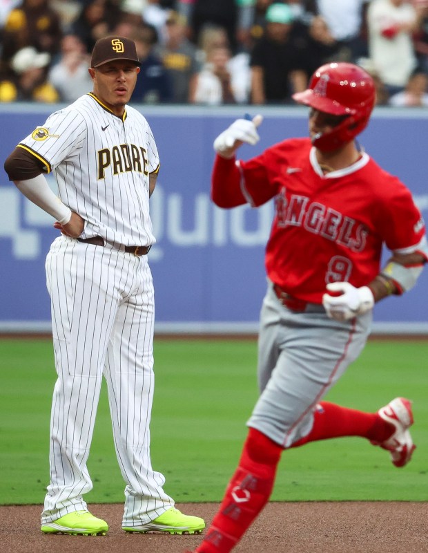San Diego Padres third baseman Manny Machado looks on as Los Angeles Angels shortstop Zach Neto rounds the bases after a home run during the first inning at Petco Park on Tuesday, May 13, 2025 in San Diego, CA. (Meg McLaughlin / The San Diego Union-Tribune)