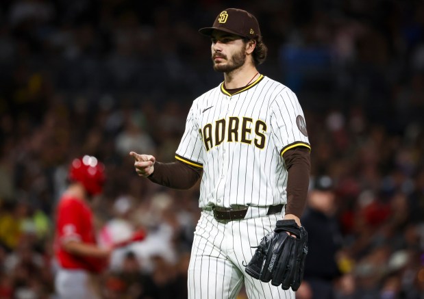 San Diego Padres starting pitcher Dylan Cease gestures as he walks back to the dugout during the sixth inning against the Los Angeles Angels at Petco Park on Tuesday, May 13, 2025 in San Diego, CA. (Meg McLaughlin / The San Diego Union-Tribune)