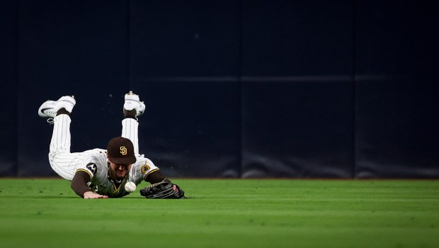 San Diego Padres center fielder Jackson Merrill is unable to catch a line drive hit by Los Angeles Angels first baseman Nolan Schanuel during the eighth inning at Petco Park on Tuesday, May 13, 2025 in San Diego, CA. (Meg McLaughlin / The San Diego Union-Tribune)