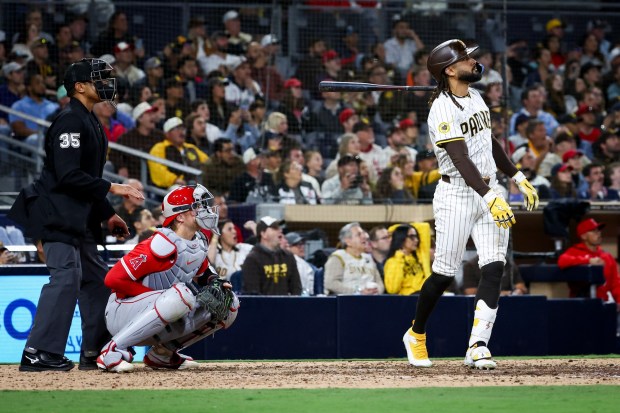 San Diego Padres right fielder Fernando Tatis Jr. tosses his bat after hitting a two-run, walk-off home run during the ninth inning for a 6-4 victory over the Angels on Tuesday, May 13, 2025 at Petco Park in San Diego. (Meg McLaughlin / The San Diego Union-Tribune)