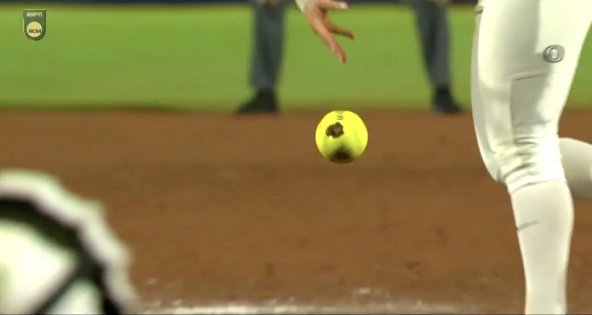 ESPN catches softball pitcher firing clump of dirt into catcher's eye