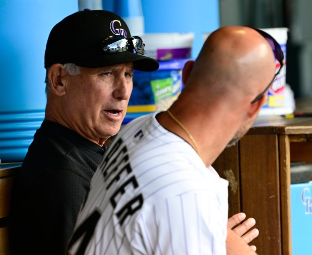 Colorado Rockies manager Bud Black talks with third base coach/infield coach Warren Schaeffer (34), left, in the dugout before the game against the Atlanta Braves at Coors Field in Denver on Wednesday, April 30, 2025. (Photo by Andy Cross/The Denver Post)